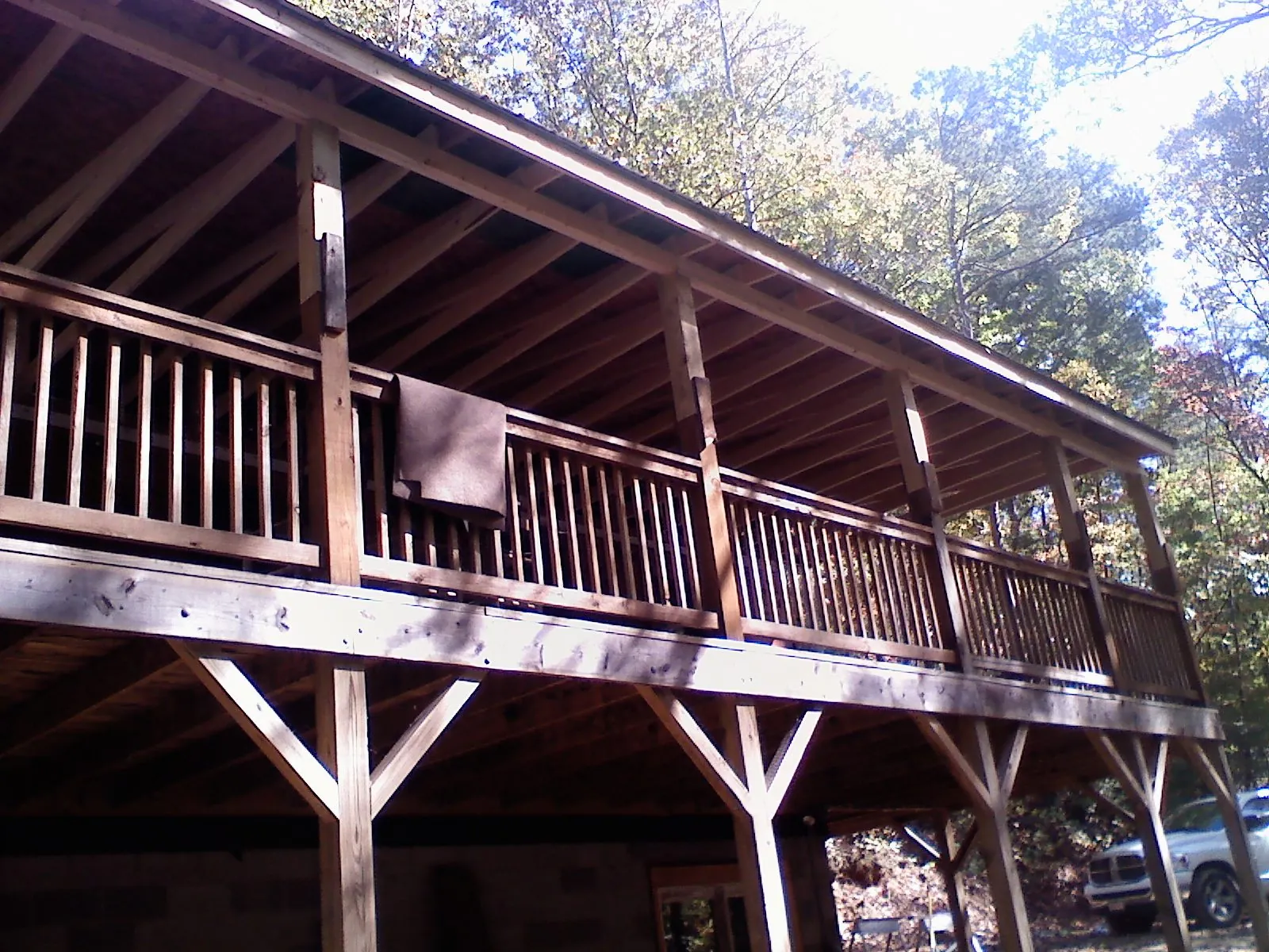 Timber framing under a new elevated porch and deck — Roof Leak Repair in Hysham by Roofing Brothers